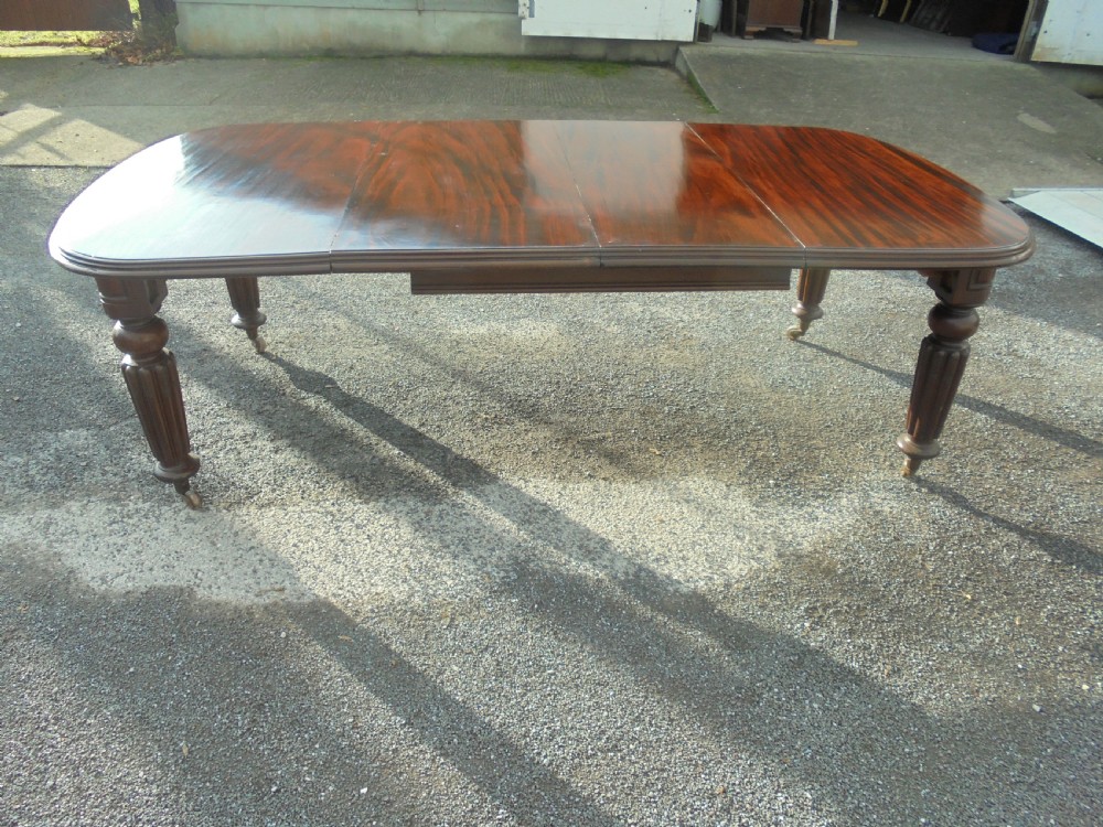 19th century mahogany two leaf extending dining table Seats ten View VI