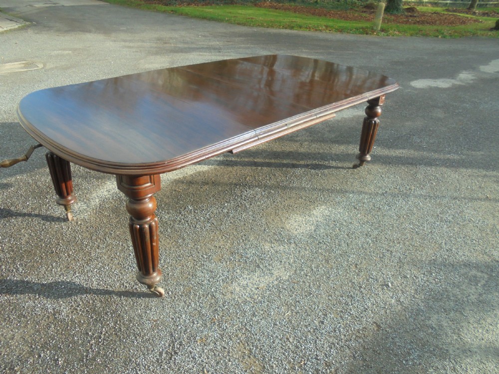 19th century mahogany two leaf extending dining table Seats ten View VIII