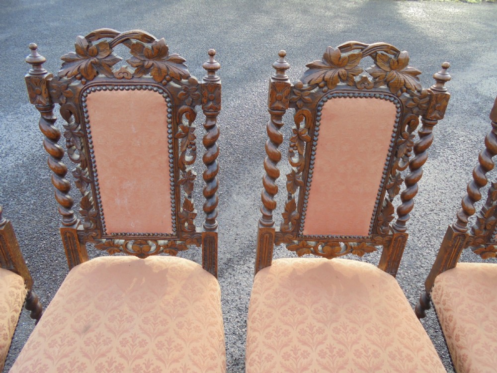 Set of 6 Oak Jacobean style carved chairs.  View II