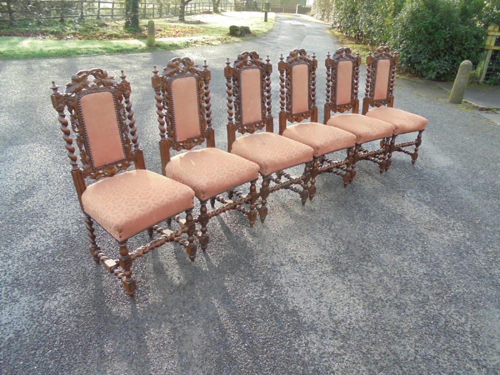 Set of 6 Oak Jacobean style carved chairs.  View III