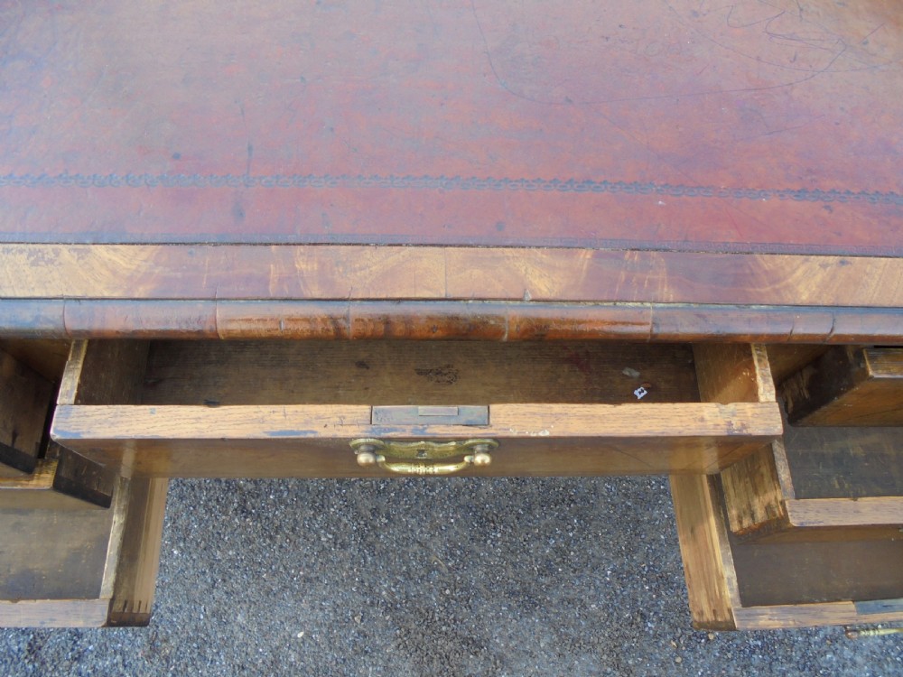Early 19th C Wanut cross banded leather top desk View IV