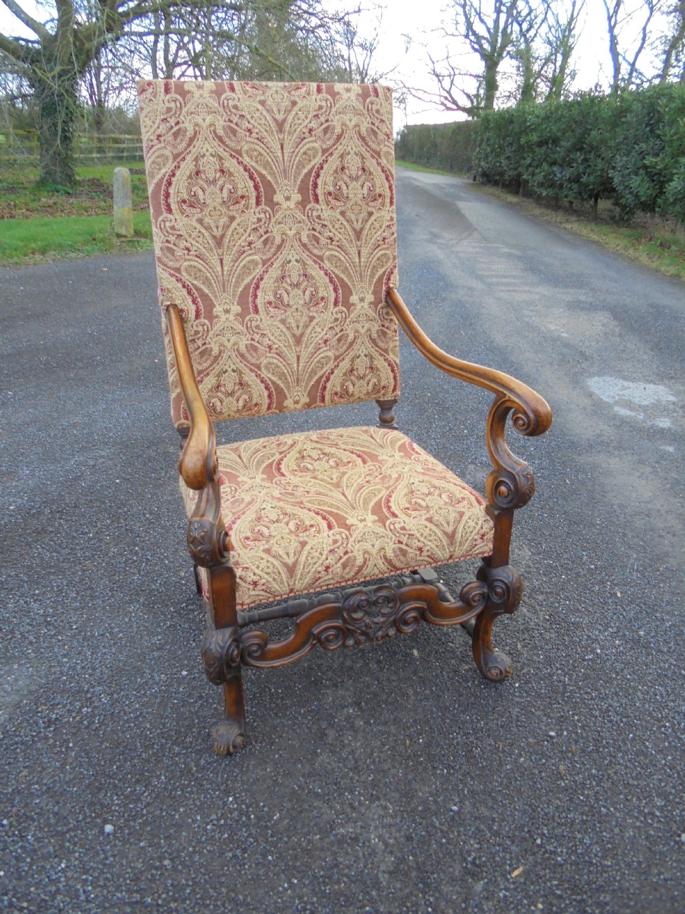 A Gentleman's upholstered armchair of generous proportions