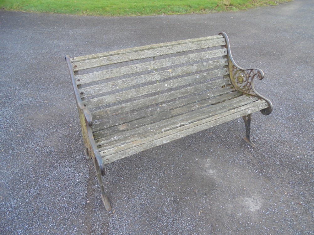 19th century Classic garden bench with cast iron ends