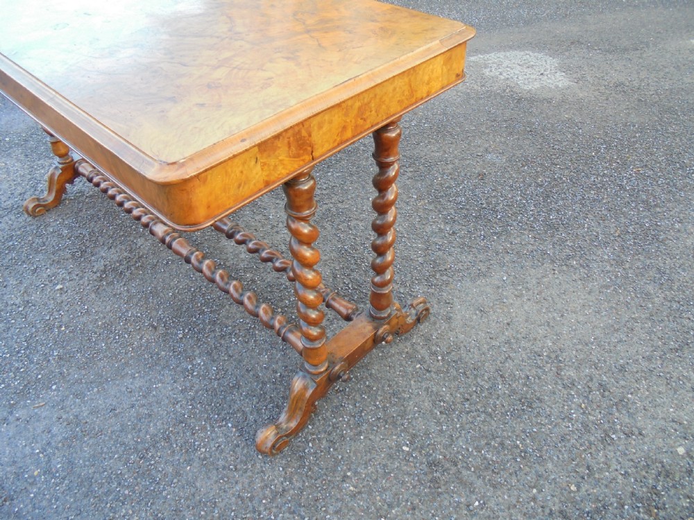 A carved burr walnut writing  ,library table View V