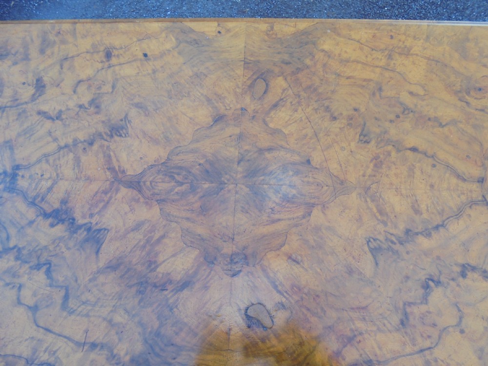 A carved burr walnut writing  ,library table View VI