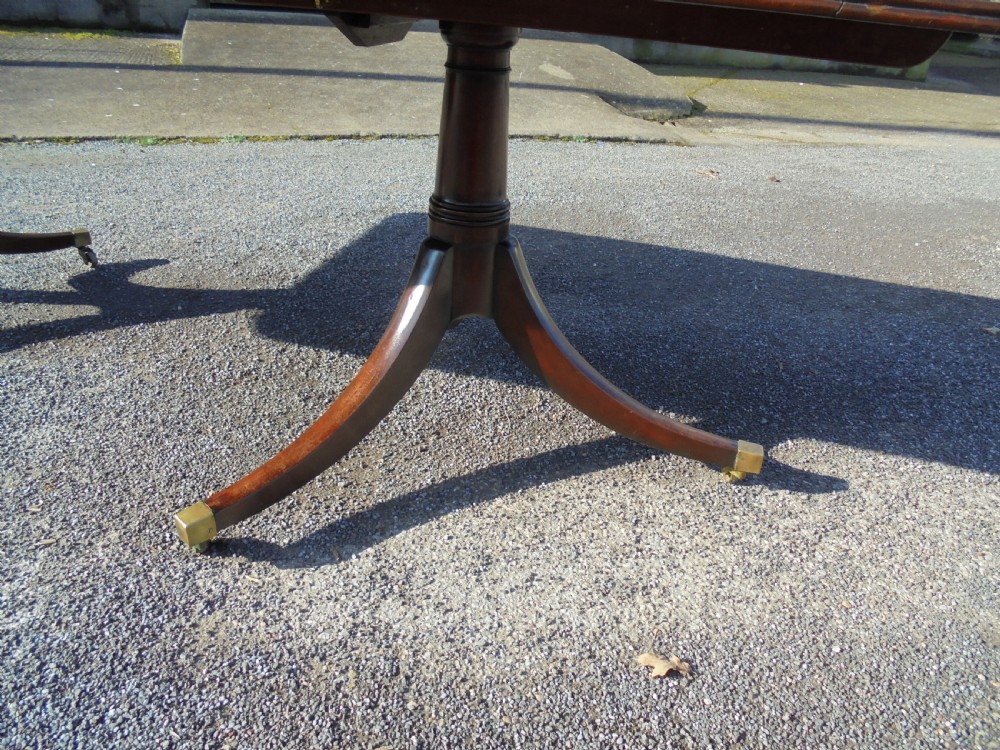 18th century mahogany twin pillar dining table. Seats ten View IV