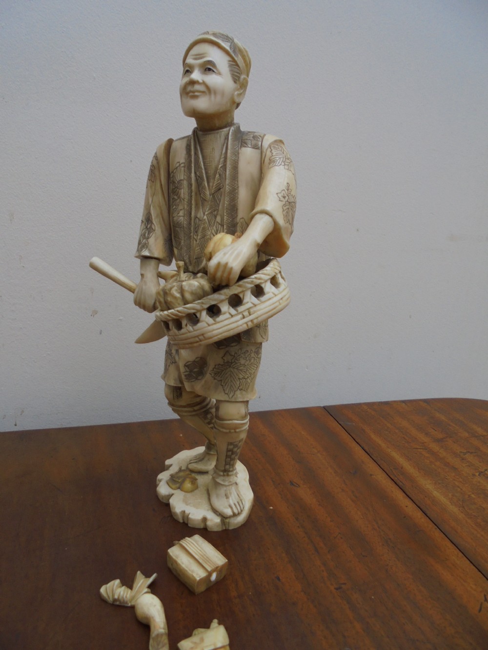 19th century jointed Japanese ivory figure of the harvester
