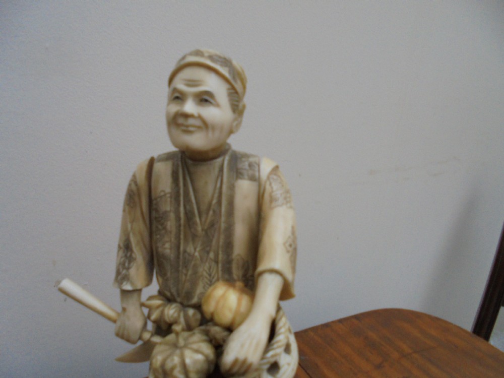 19th century jointed Japanese ivory figure of the harvester View III