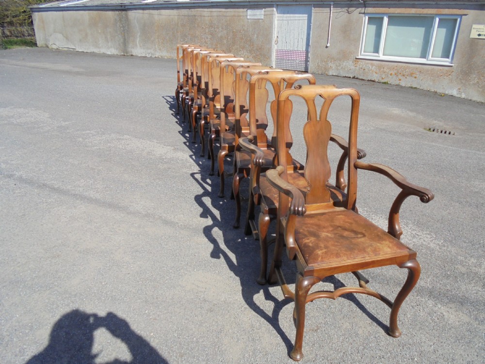 Set of ten walnut Queen Anne style dining chairs