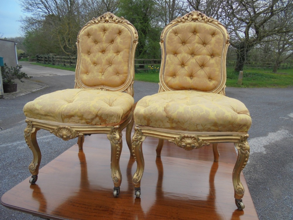 Pair 19th century French gilded salon chairs View II