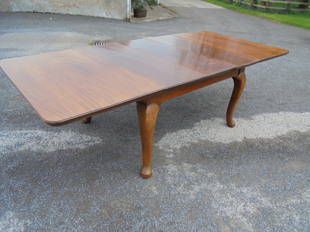 Solid walnut three leaf dining table seats ten