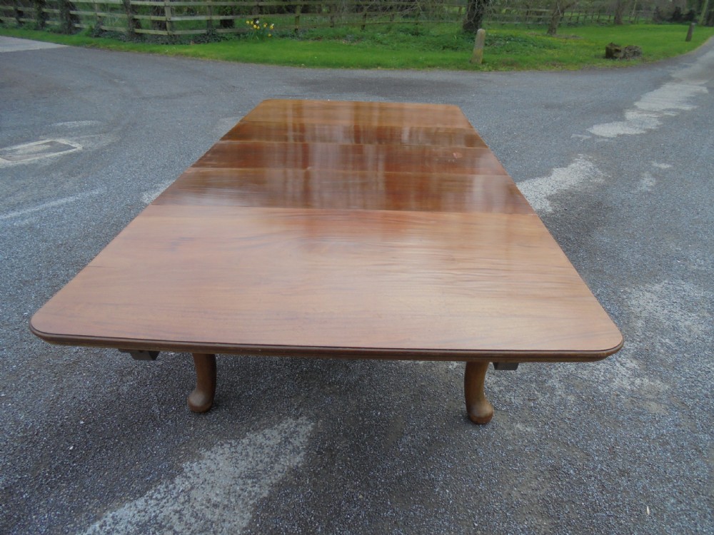 Solid walnut three leaf dining table seats ten View III
