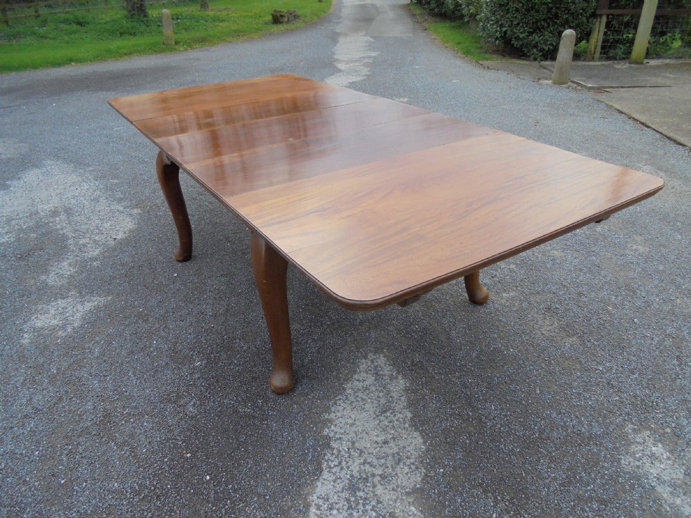Solid walnut three leaf dining table seats ten View IV