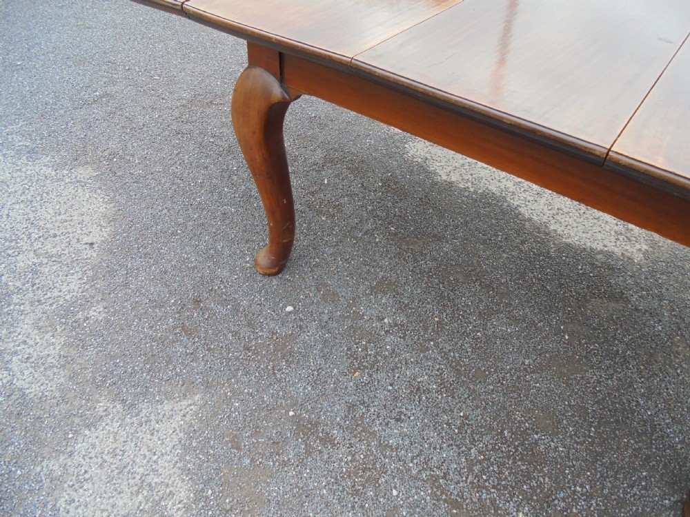 Solid walnut three leaf dining table seats ten View V