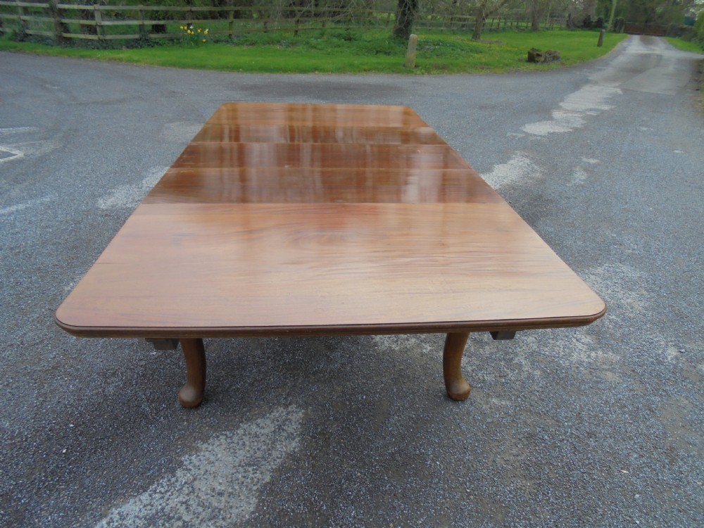 Solid walnut three leaf dining table seats ten View VI