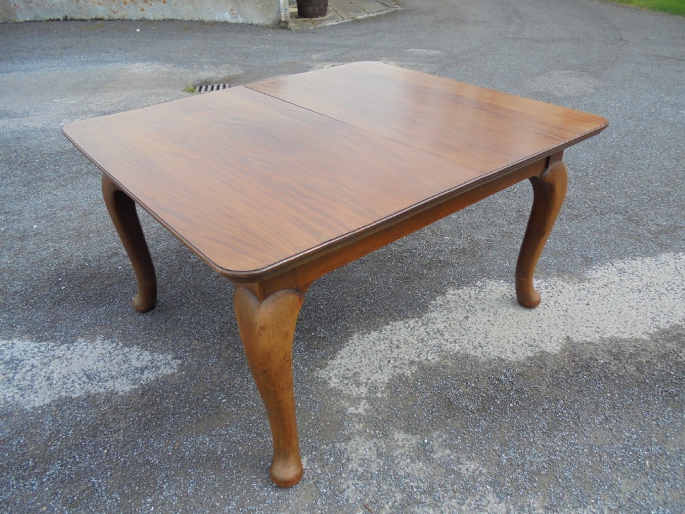 Solid walnut three leaf dining table seats ten View VII