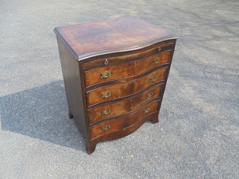 Small walnut four drawer chest with slide View II