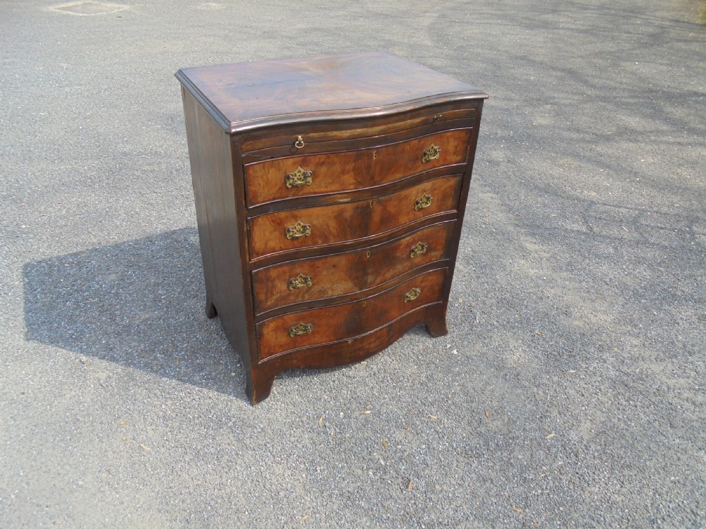 Small walnut four drawer chest with slide View III