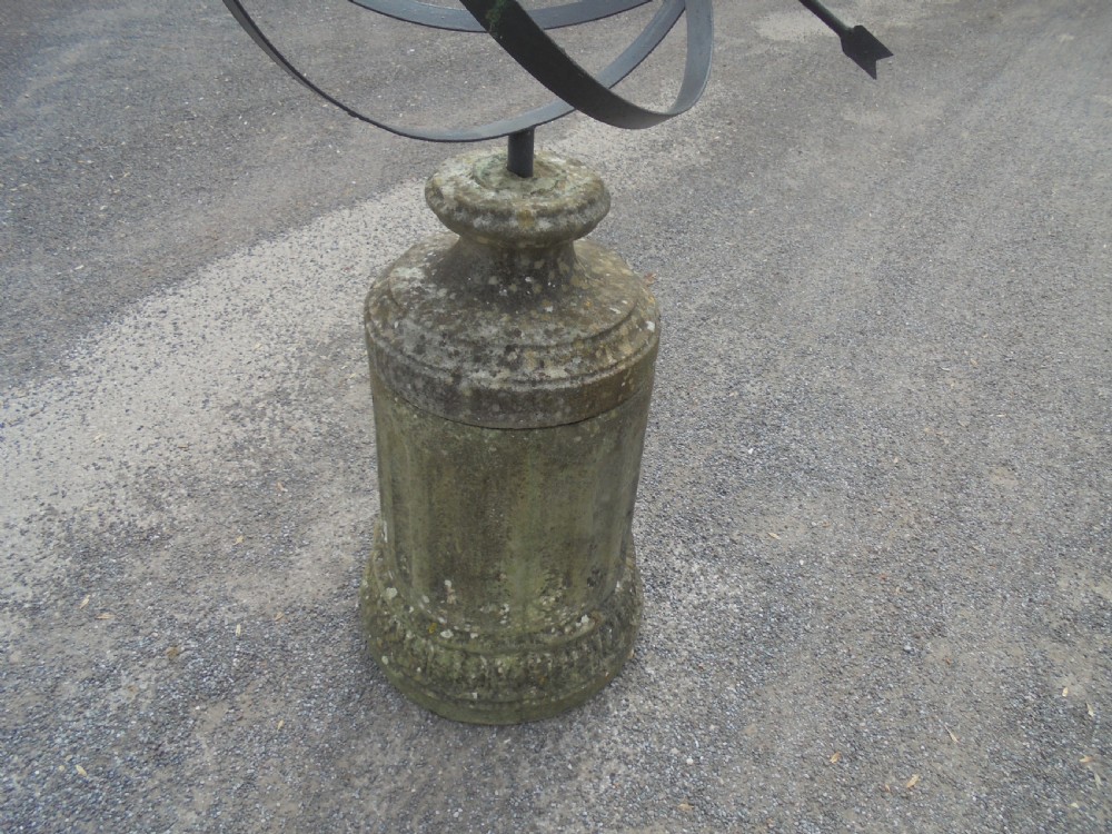 Armillary sphere standing on a weathered stone base View V