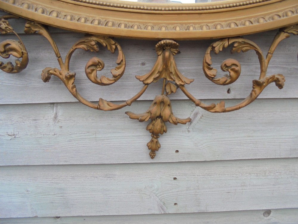 Victorian Adams style gilded oval wall mirror View II