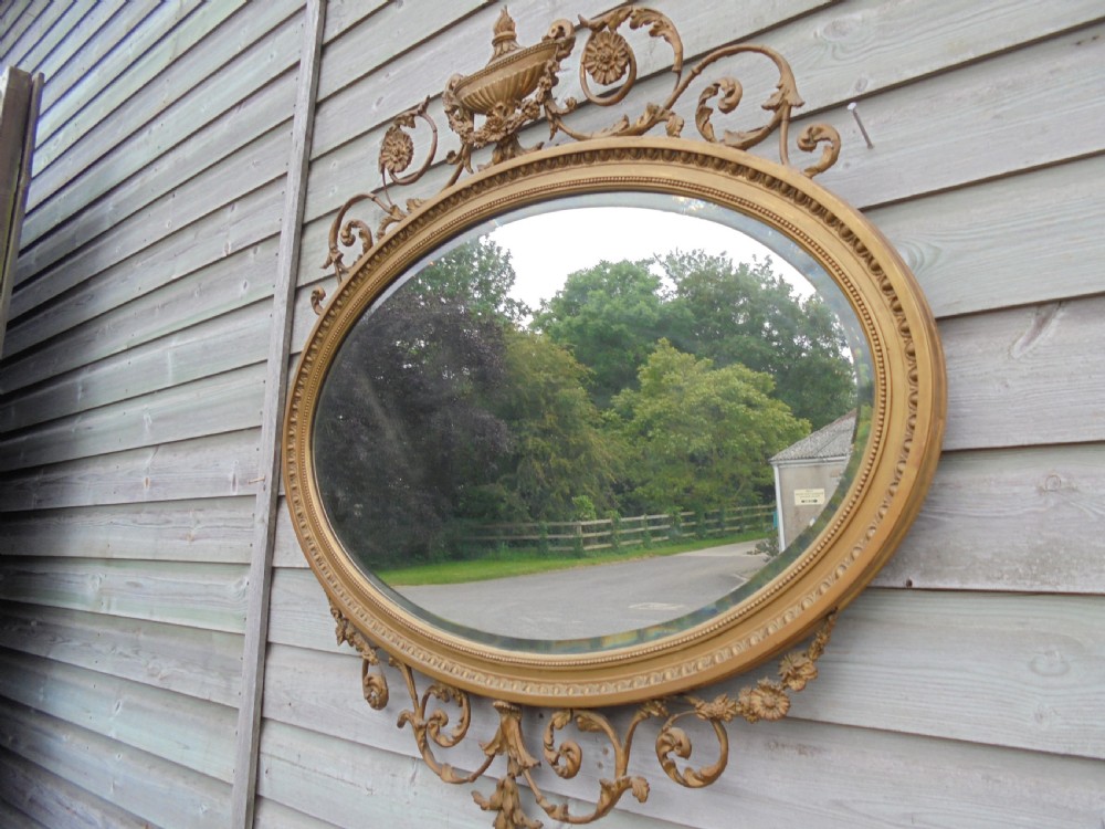Victorian Adams style gilded oval wall mirror View V