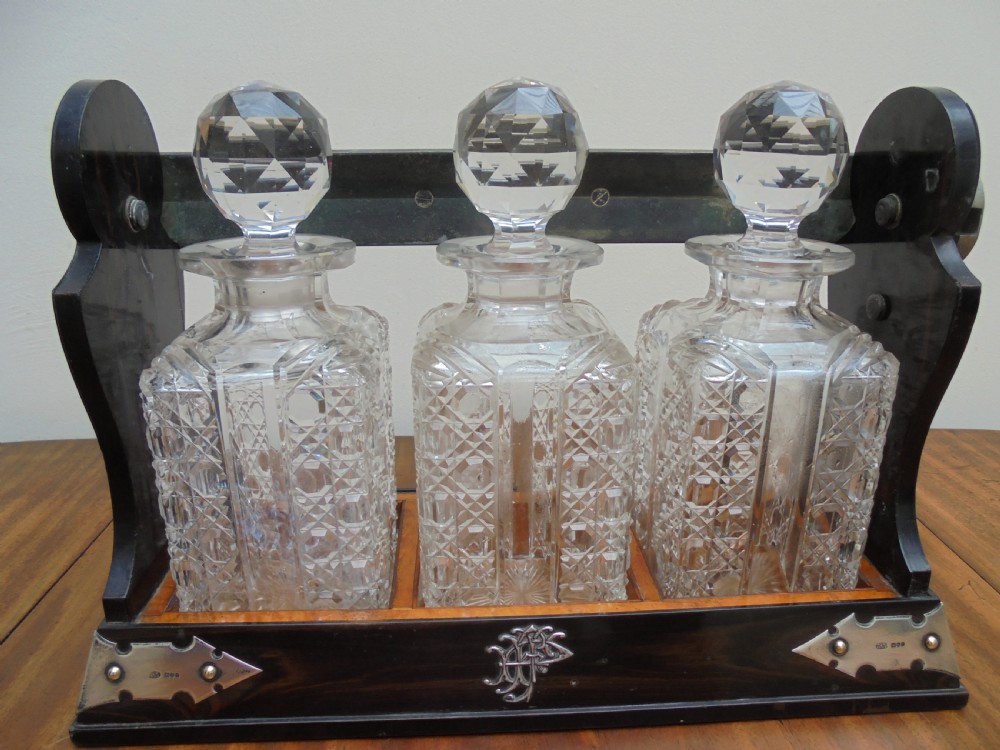 Betjemanns coromandel tantalus three bottle silver mounted  View VII