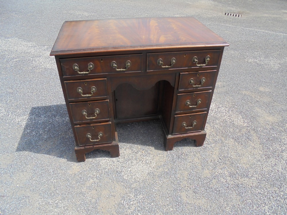 Mahogany Queen Anne style nine drawer kneehole desk View III