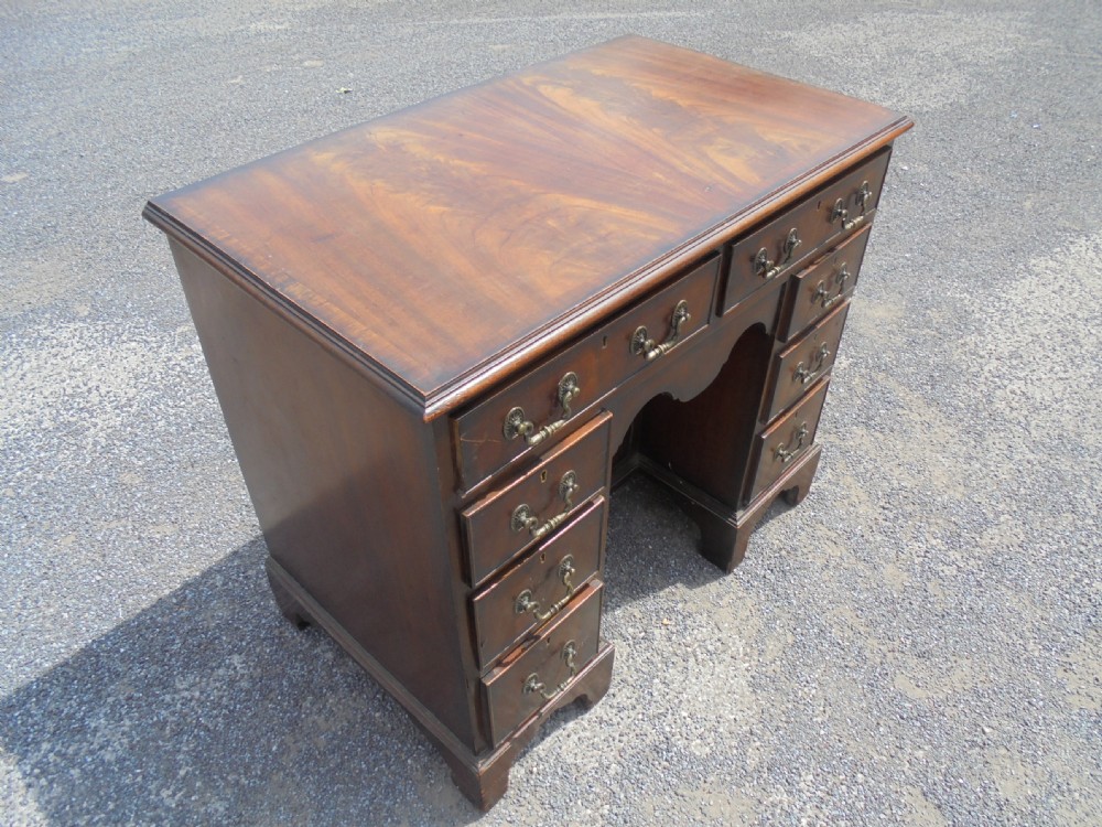 Mahogany Queen Anne style nine drawer kneehole desk View IV