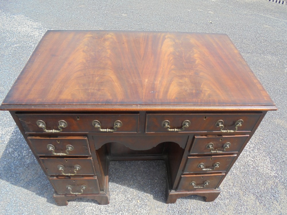 Mahogany Queen Anne style nine drawer kneehole desk View V