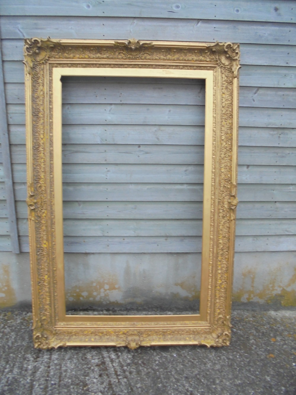 Large 18th century gilded portrait frame .