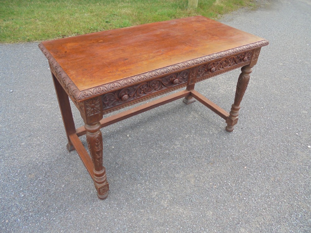 19th century carved oak  two drawer writing desk View II