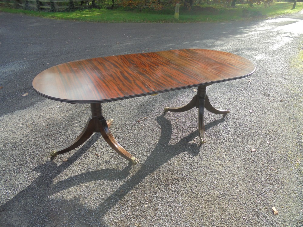 Mahogany Regency style twin pillar dining table