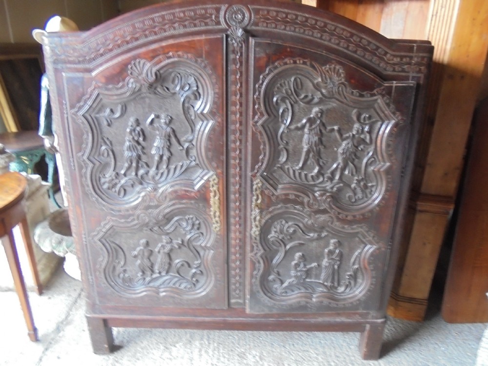 18th century French cupboard with carvings