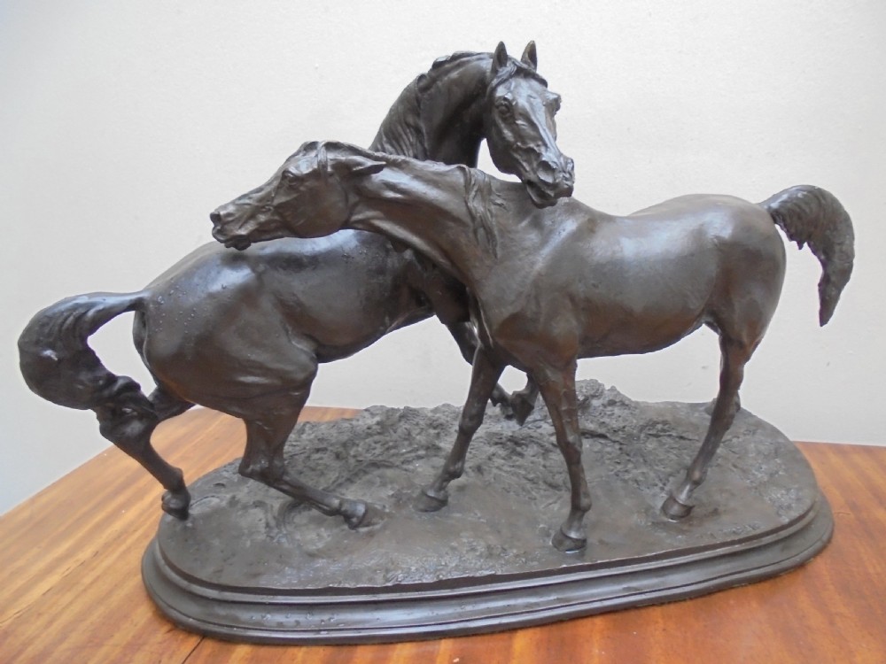 Bronzed study of Stallion and Mare