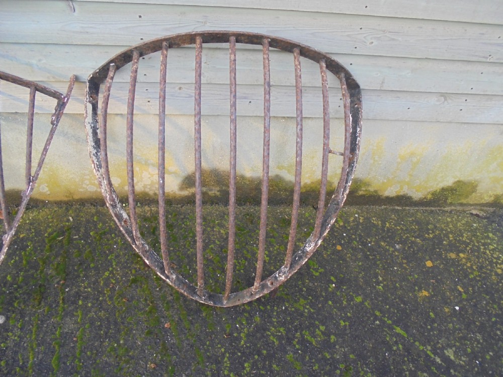 Two Victorian cast iron , corner hay racks , planters View III