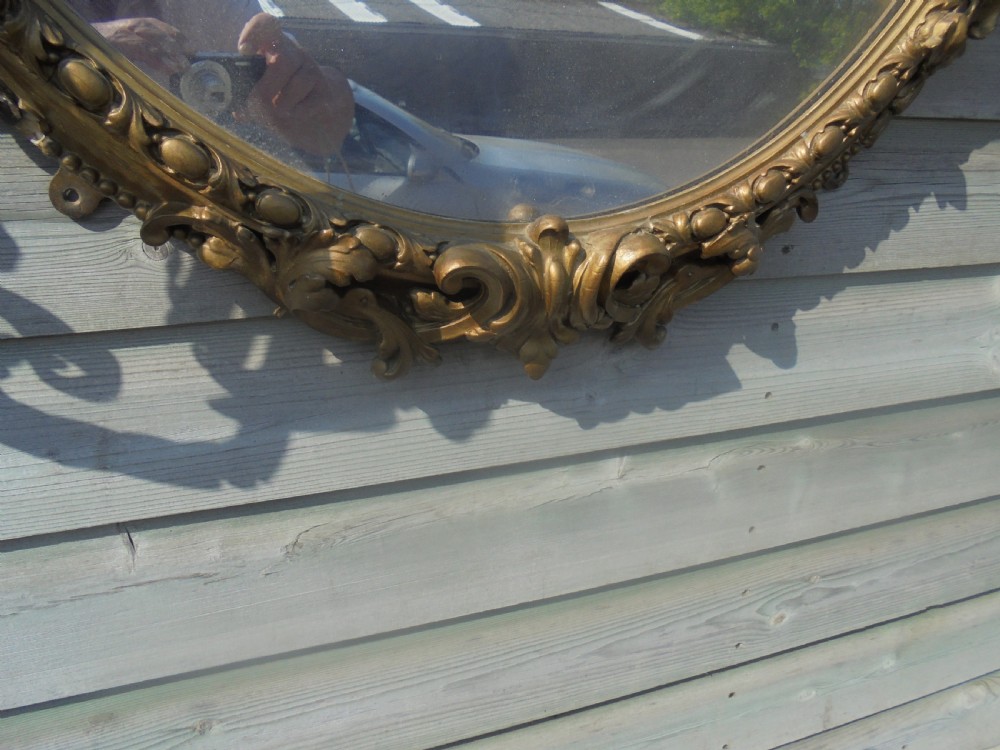 Victorian oval gilded mirror with candelabra View III