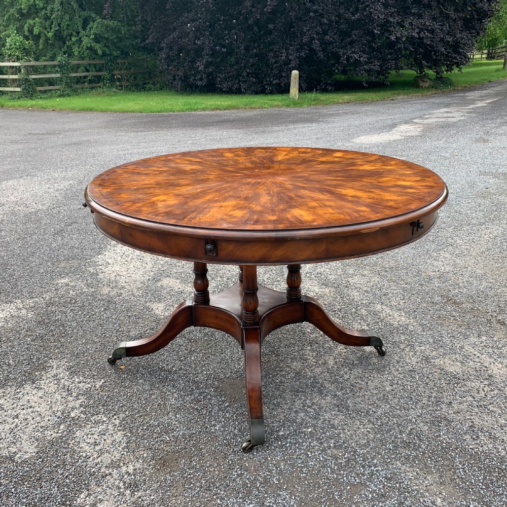 Extending circular dining table seats eight View II