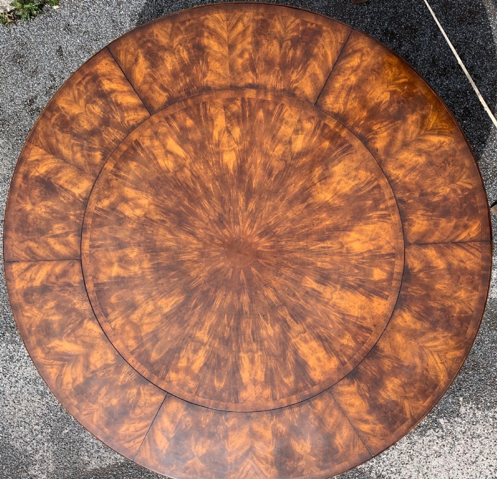 Extending circular dining table seats eight View V