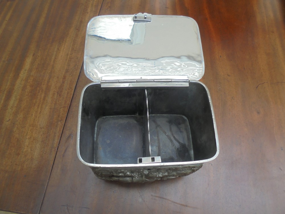 Silver plated tea caddy depicting horses and riders View V