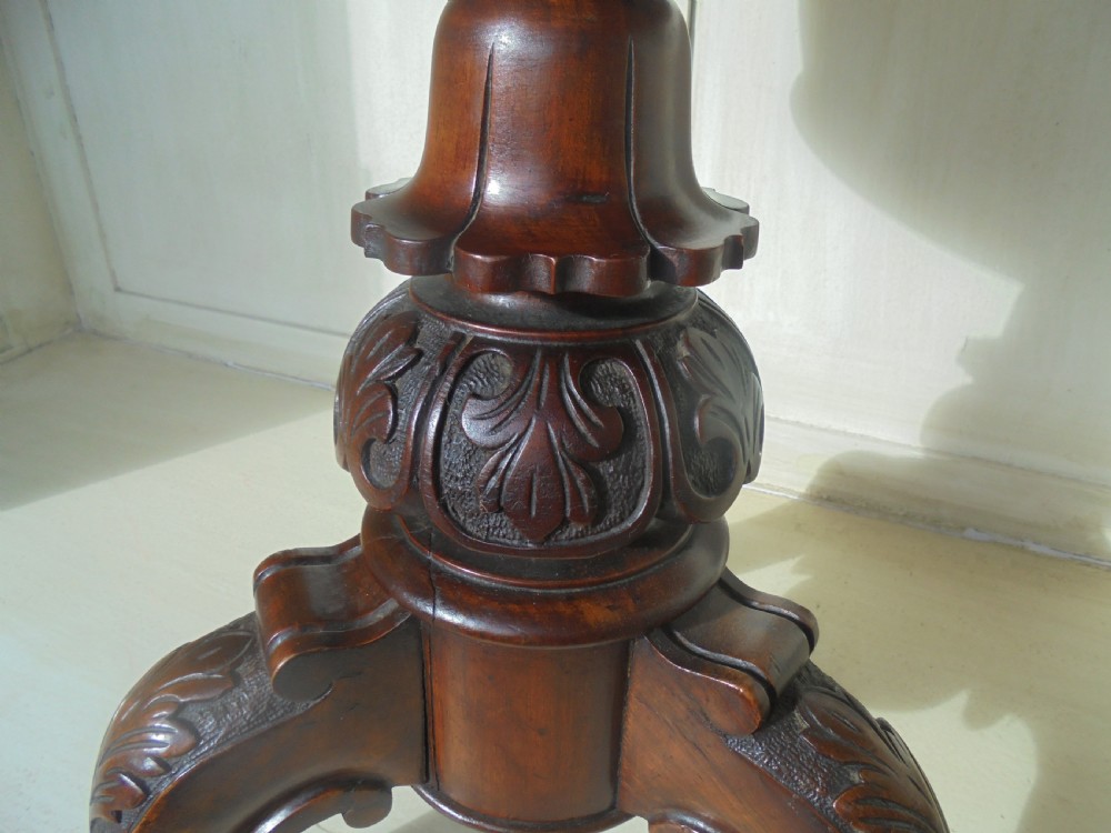 Carved walnut revolving piano stool by Henry Brookes and Co View II