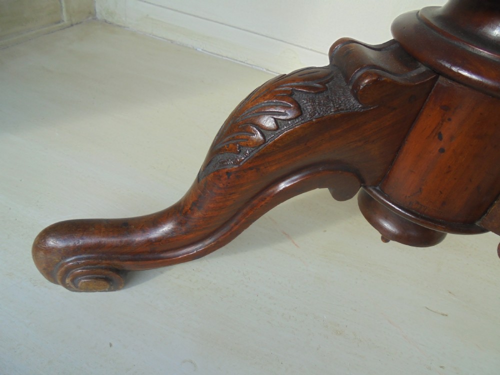 Carved walnut revolving piano stool by Henry Brookes and Co View III