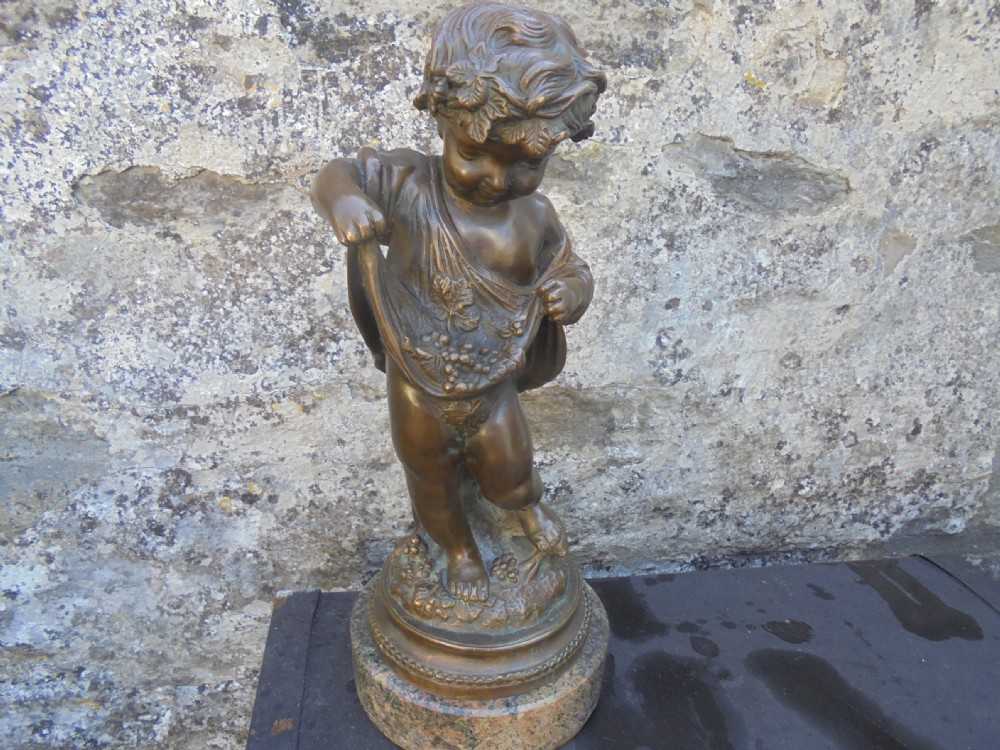 Antique bronze figure of Cherub on marble base