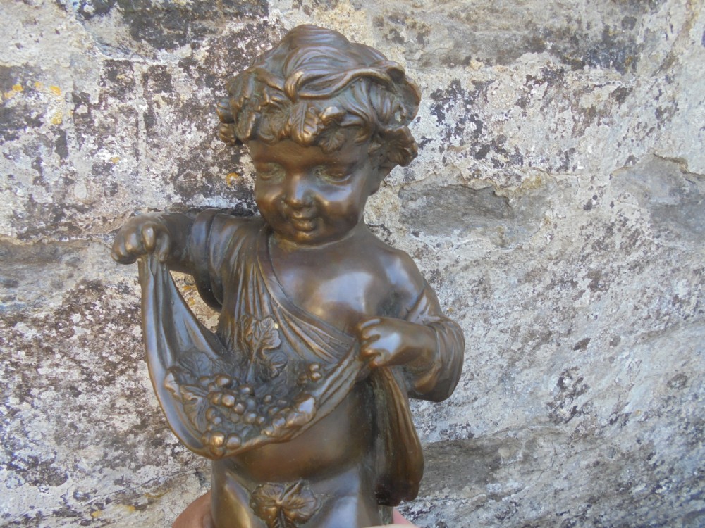 Antique bronze figure of Cherub on marble base View III