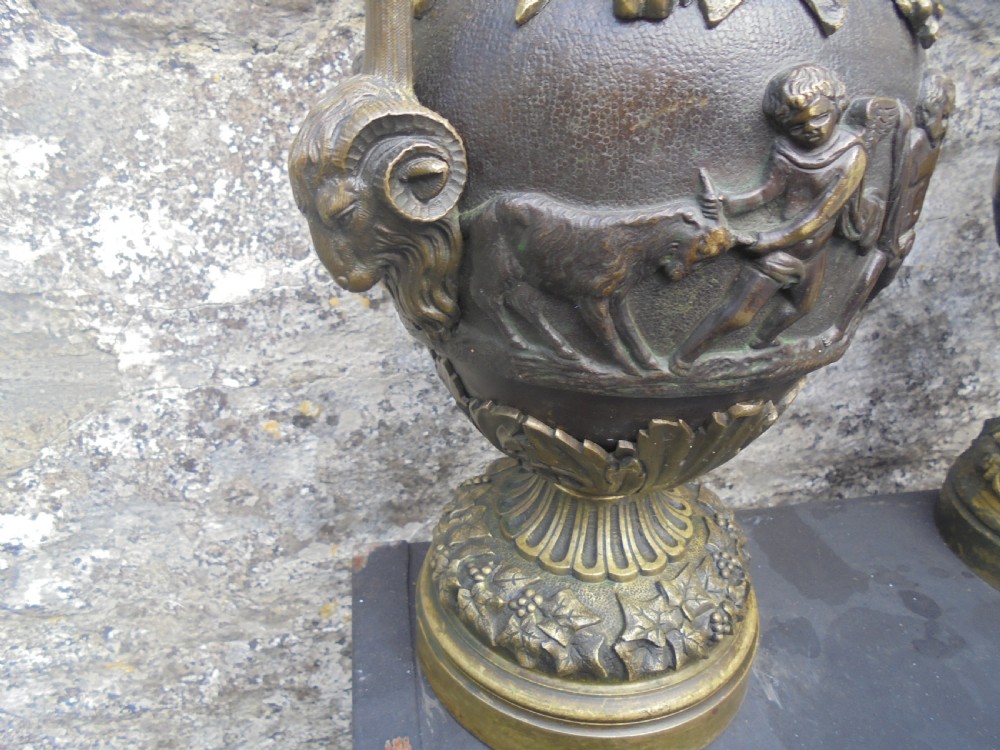 Large pair 19th century bronze ewers with cherubs View IV