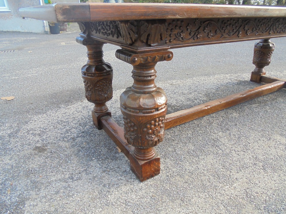 Carved oak refectory table  seats ten View V