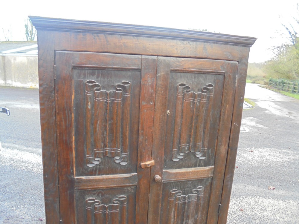 English oak linen fold cupboard storage View IV