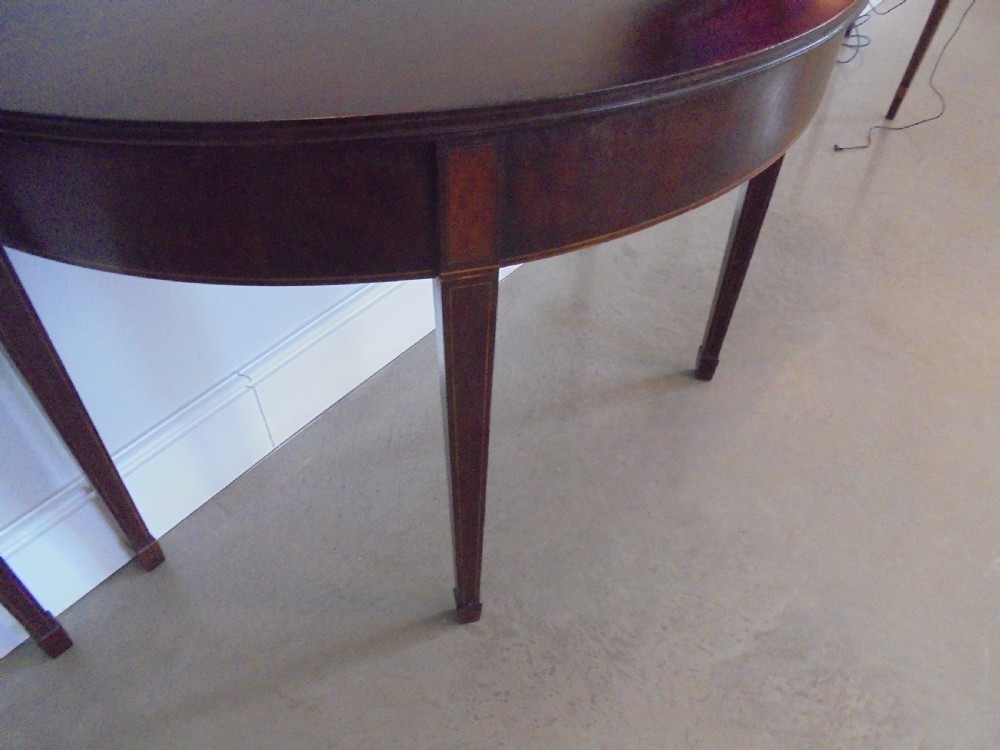 Fine pair of 18th century mahogany demi lune console tables View II