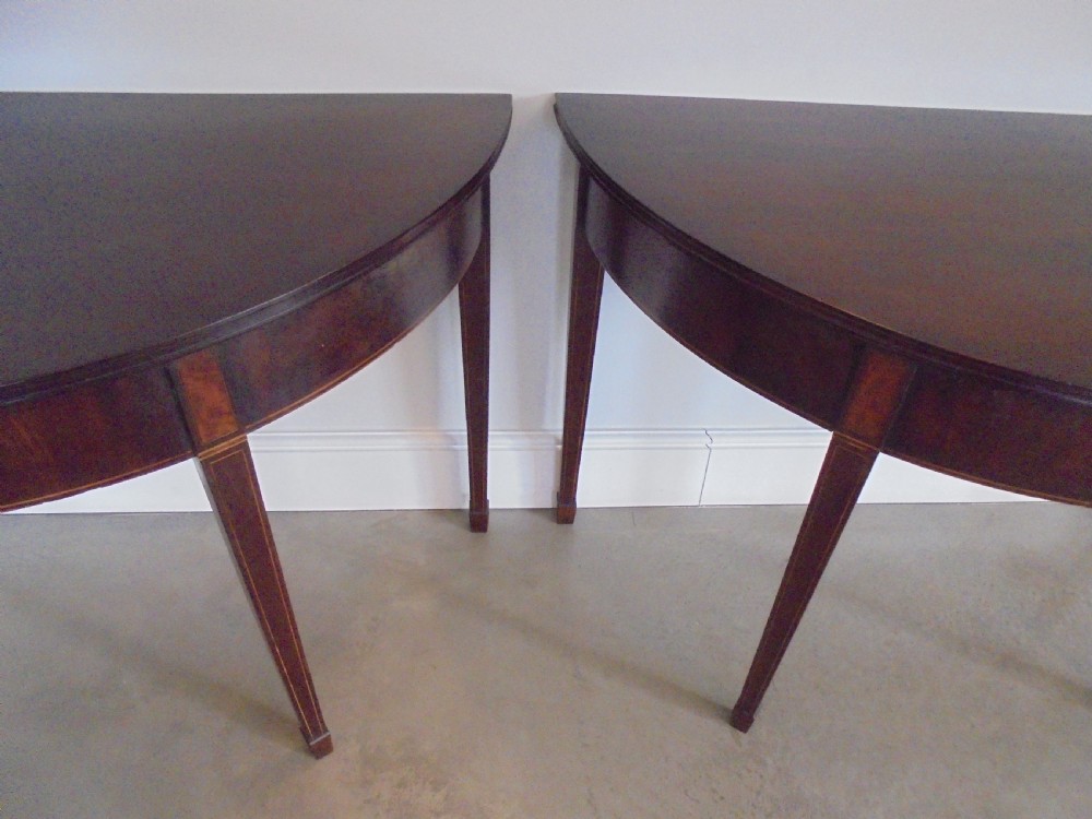 Fine pair of 18th century mahogany demi lune console tables View V