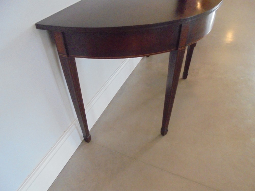 Fine pair of 18th century mahogany demi lune console tables View VIII