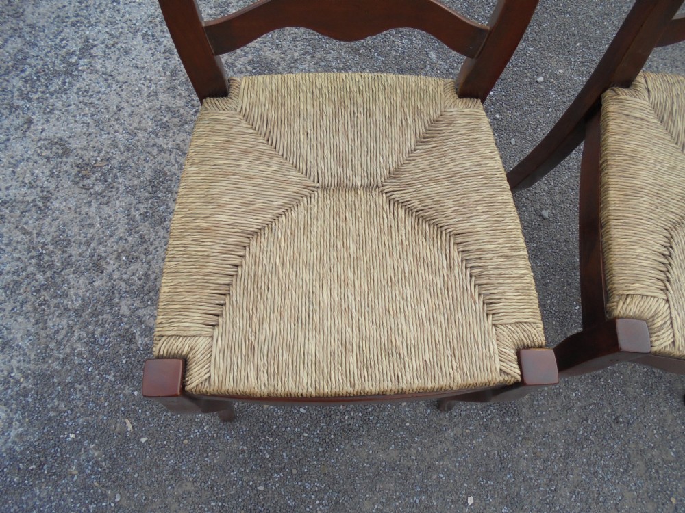 Set of eight French walnut ladder back chairs View VI